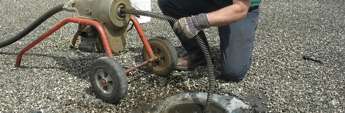 sewer rodding technician actively removing blockages from a sewer line in Salt Lake City, UT