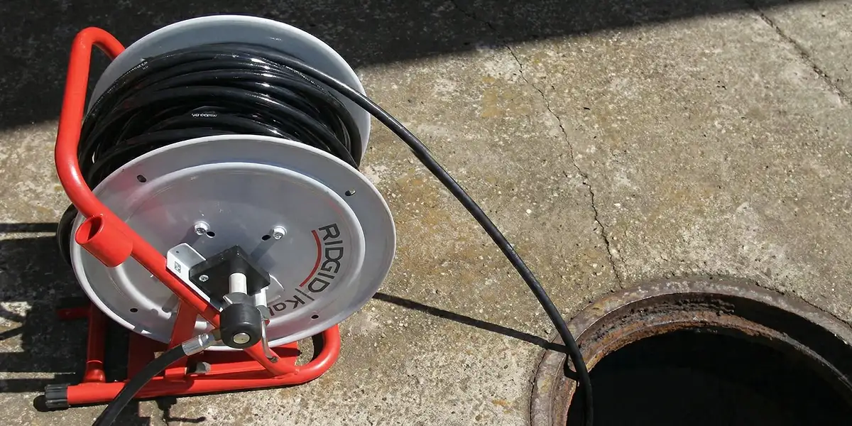 sewer rodding equipment prepared to clear clogged sewer lines in Salt Lake City, UT